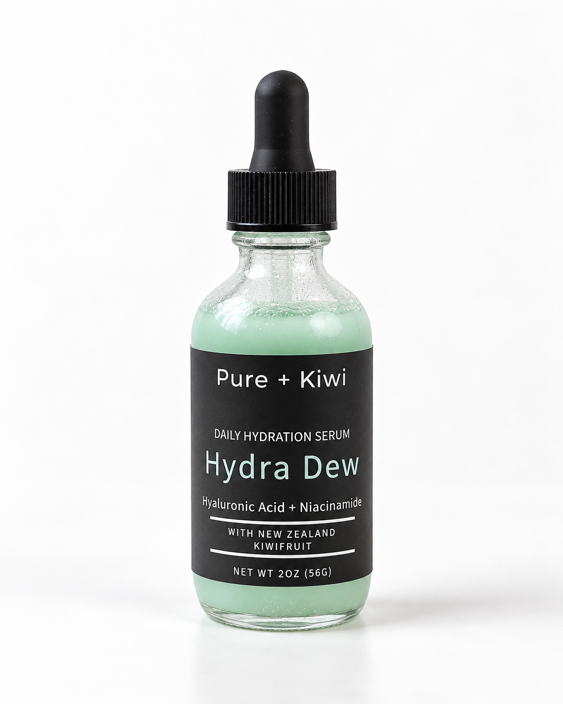 A 2 oz glass dropper bottle of Pure + Kiwi Hydra Dew Daily Hydration Serum, featuring a light mint green liquid inside a clear glass bottle with a black dropper cap and black label.